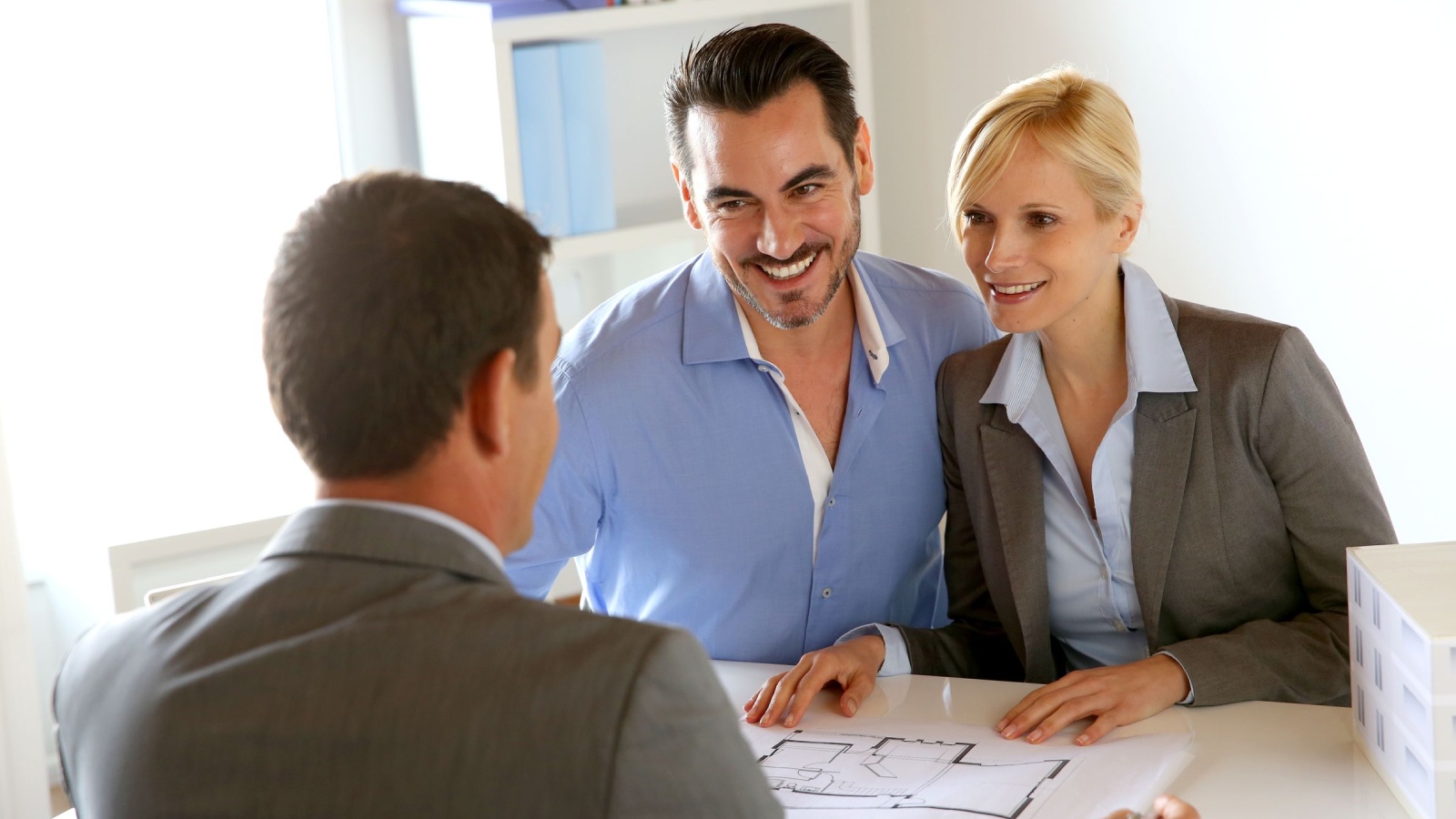 Local business owners meeting with customers